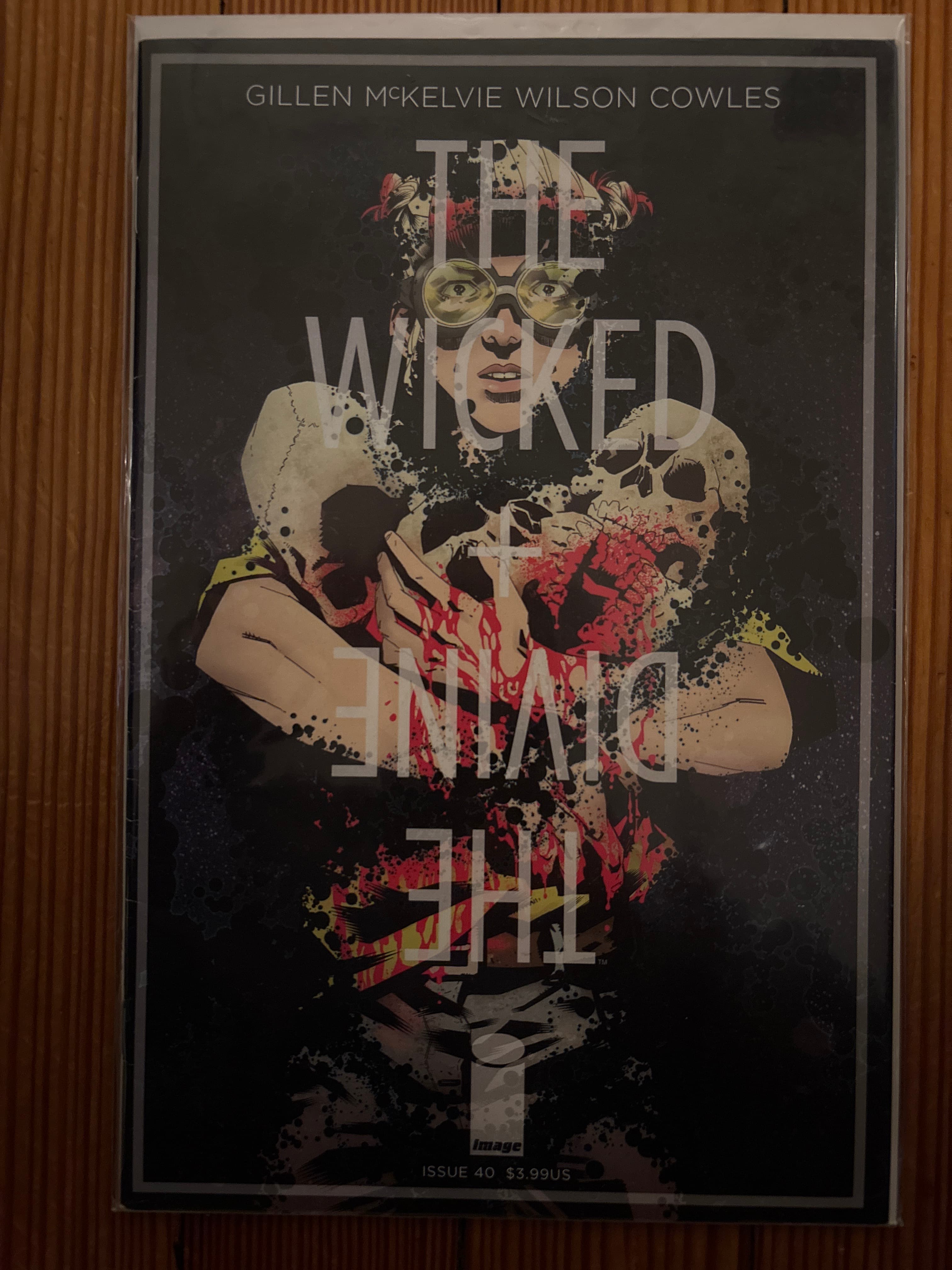 Cover of The Wicked + The Divine (2014) #40 — Cover A by Jamie McKelvie